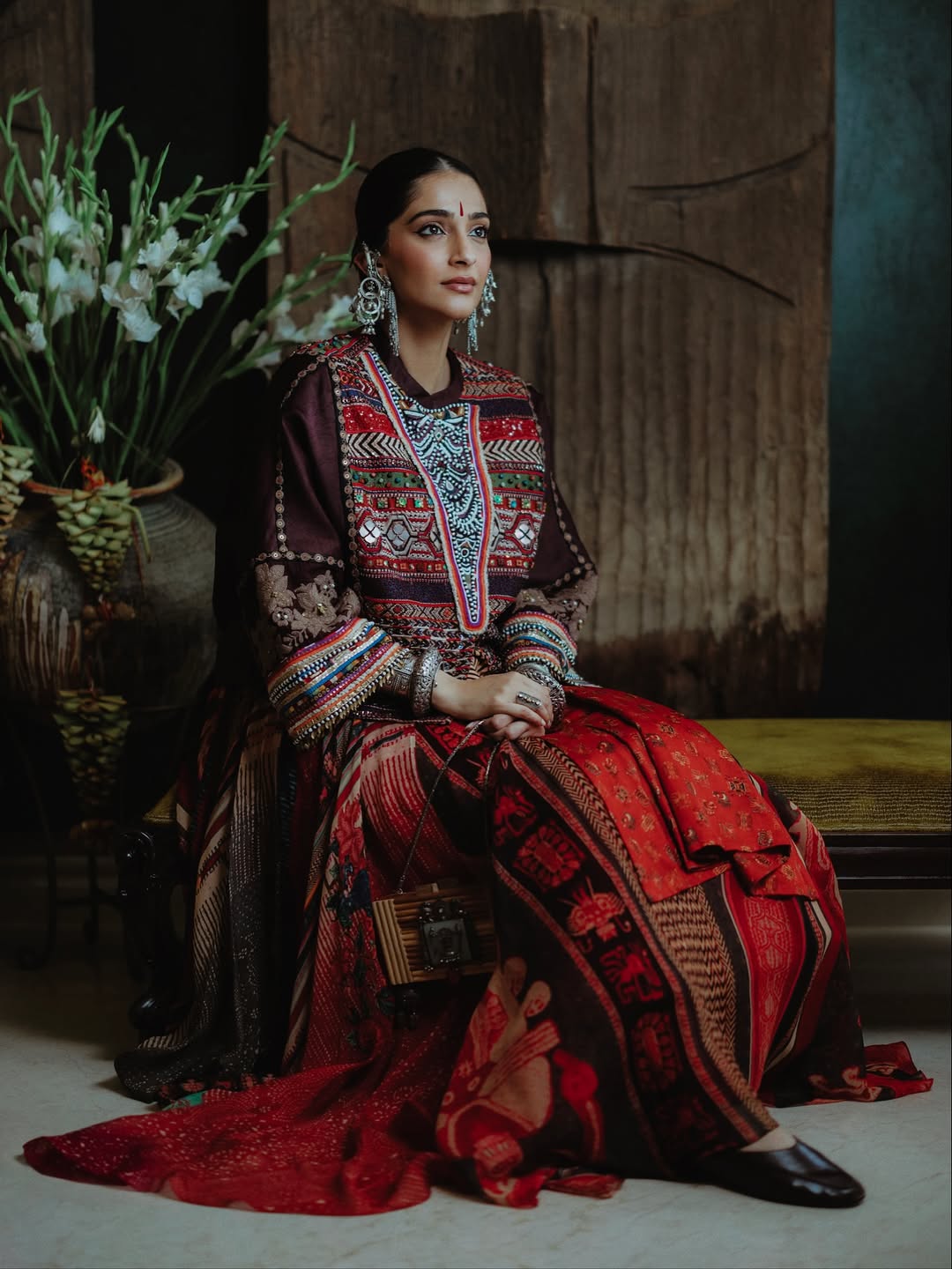 Sonam Kapoor styled with silver jewelry and red bindi