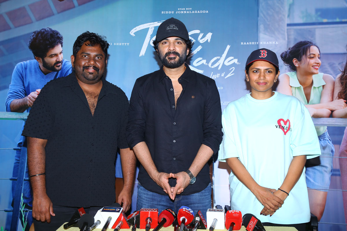 Harsha Chemudu, Siddu Jonnalagadda, and Neeraja Kona posing for event photos