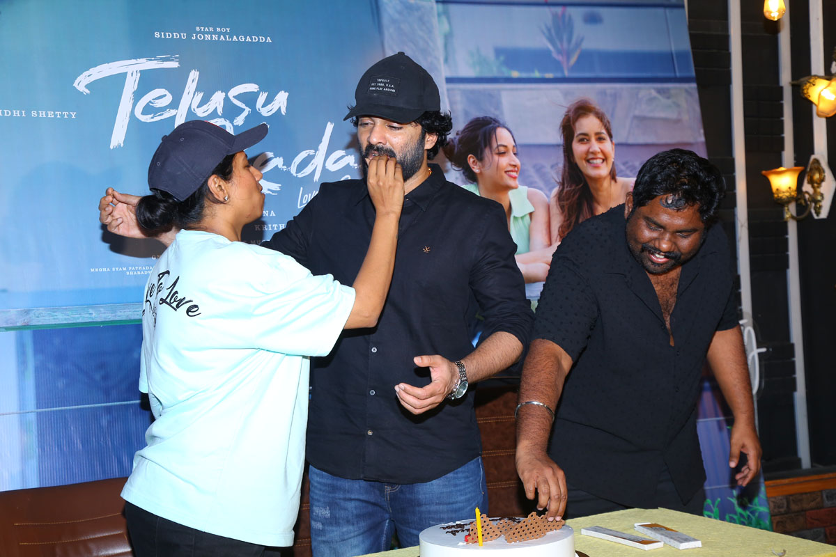 Neeraja Kona feeding cake to Siddu Jonnalagadda during success celebration