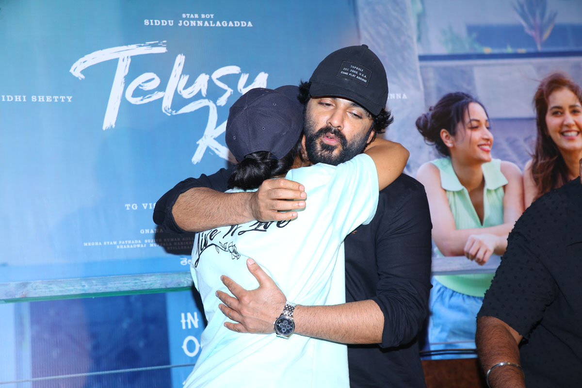 Neeraja Kona and Siddu Jonnalagadda hugging at the event
