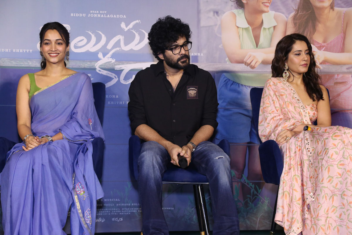 Stars seated on stage together