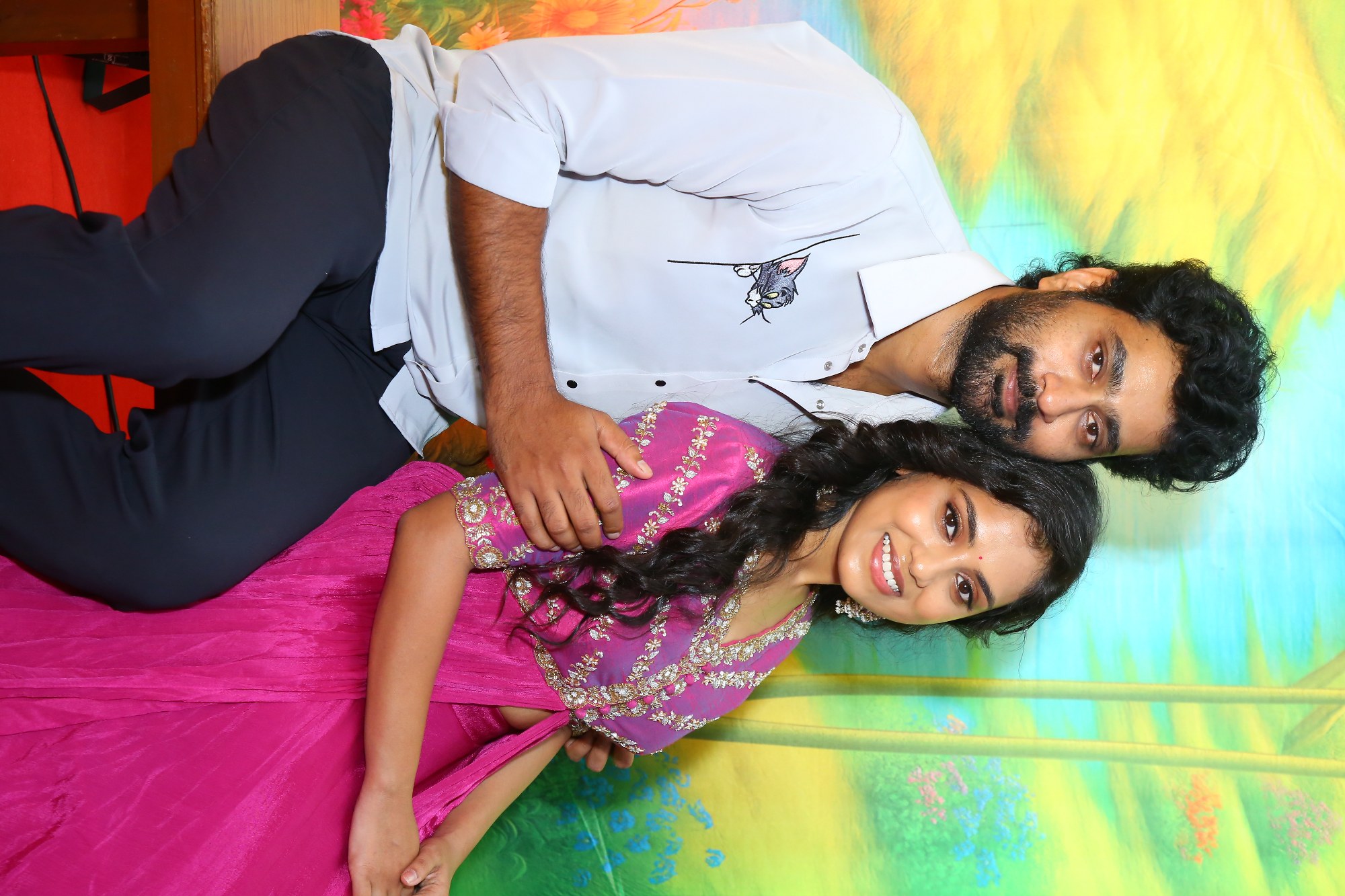 Thiruveer and Teena Sravya posing stylishly during photoshoot