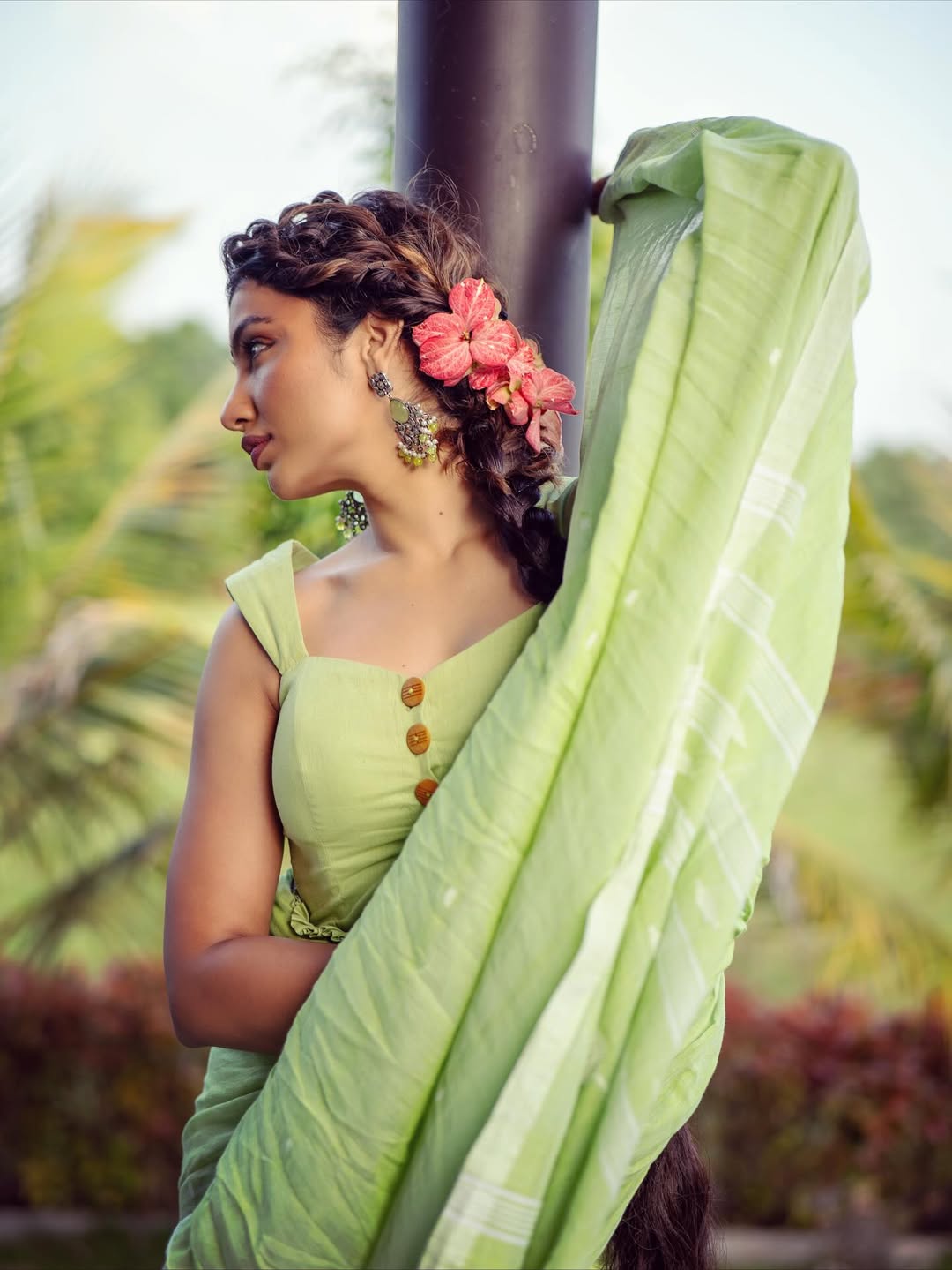 Tejaswi Madivada blooming in floral green elegance