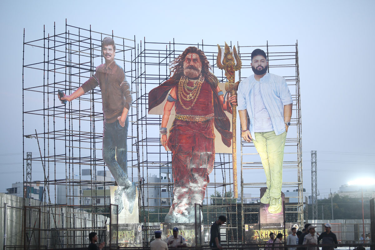 Event venue showcasing massive promotional poster