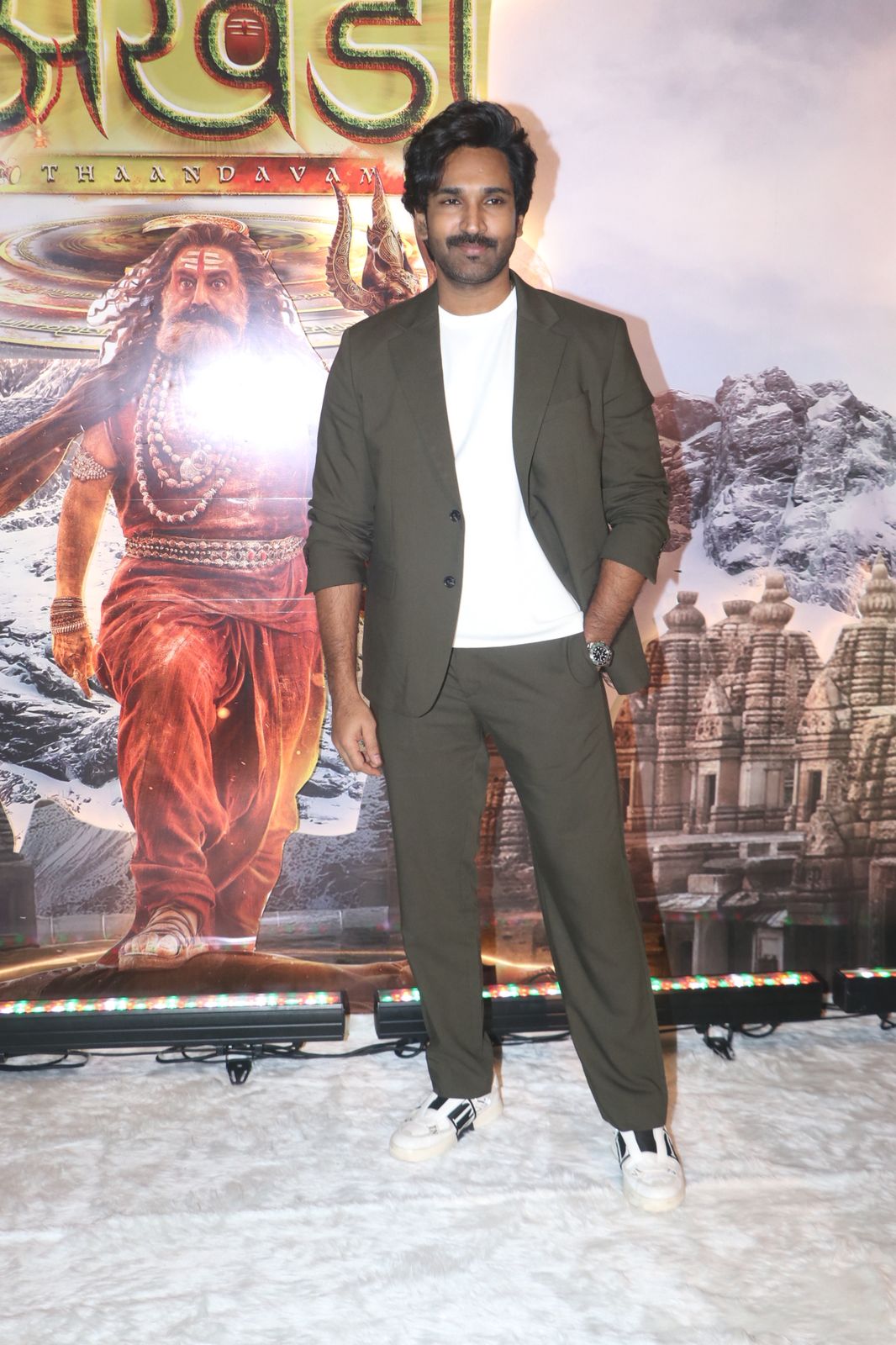 Aadhi Pinisetty posing for media