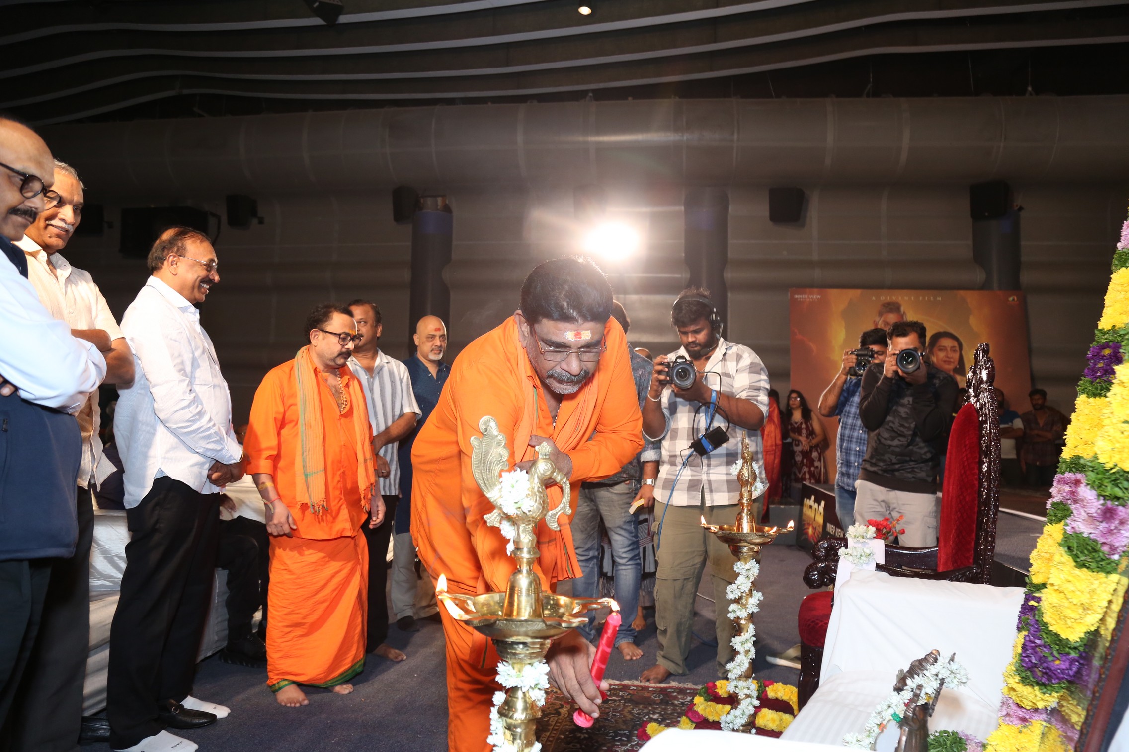 Raja Vannem Reddy lighting ceremonial lamp