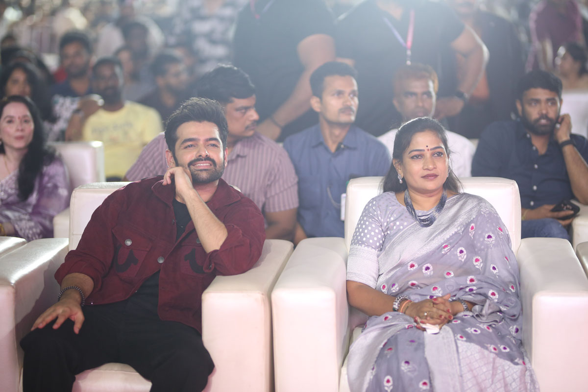 two guests seated together at event