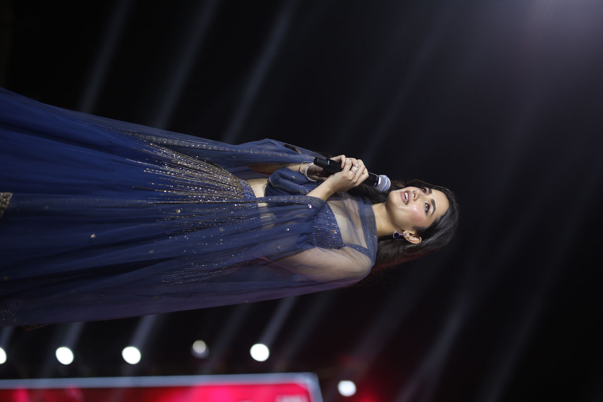 actress speaking on stage