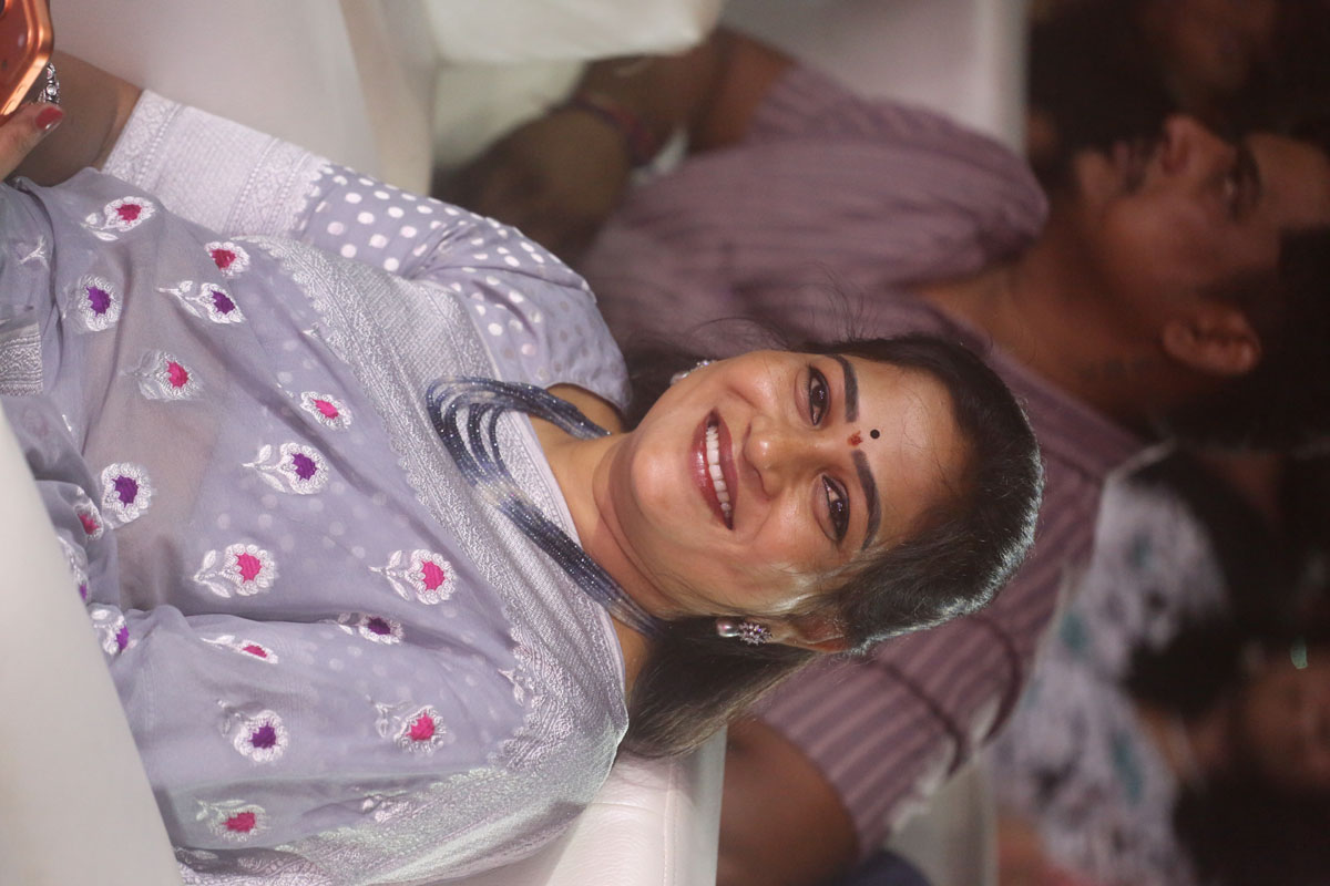 dignitary smiling while seated