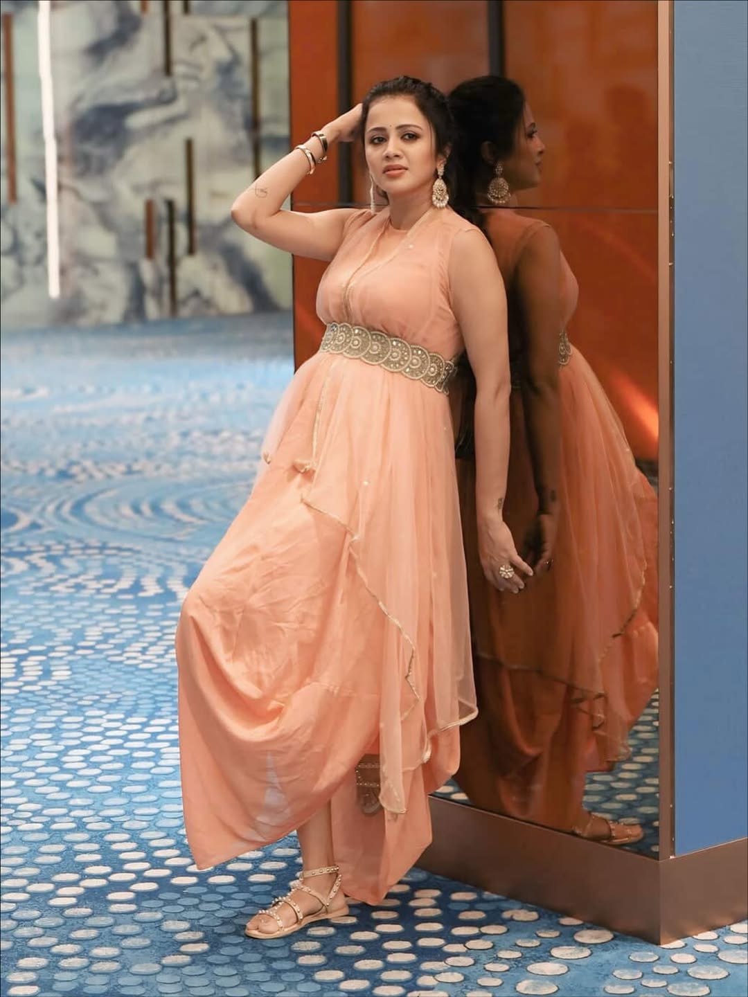 Anjana Rangan radiates confidence in peach gown with sparkling accessories