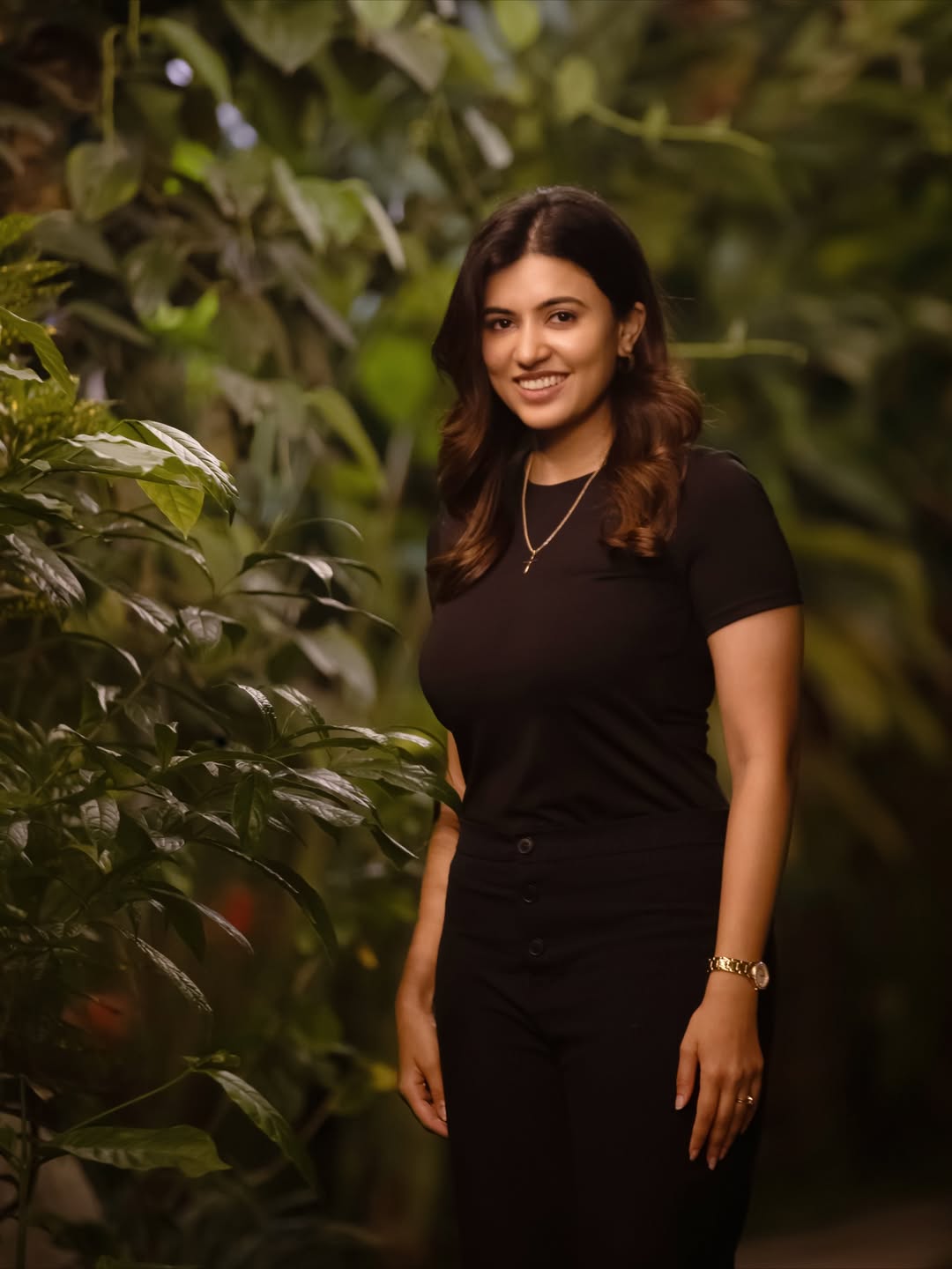 Anju Kurian stunning in sleek black and gold elegance