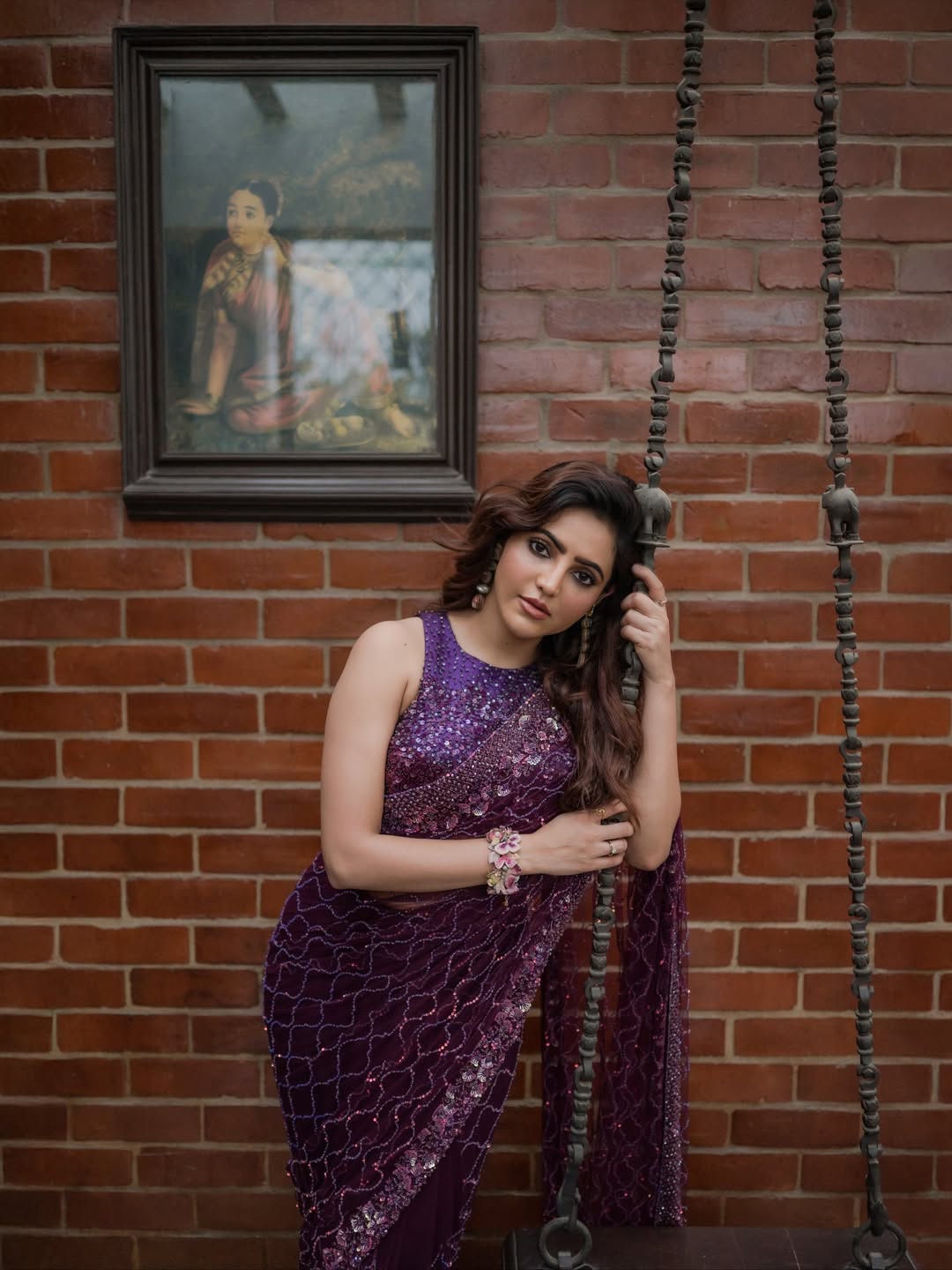 Athulya Ravi regal in purple saree elegance