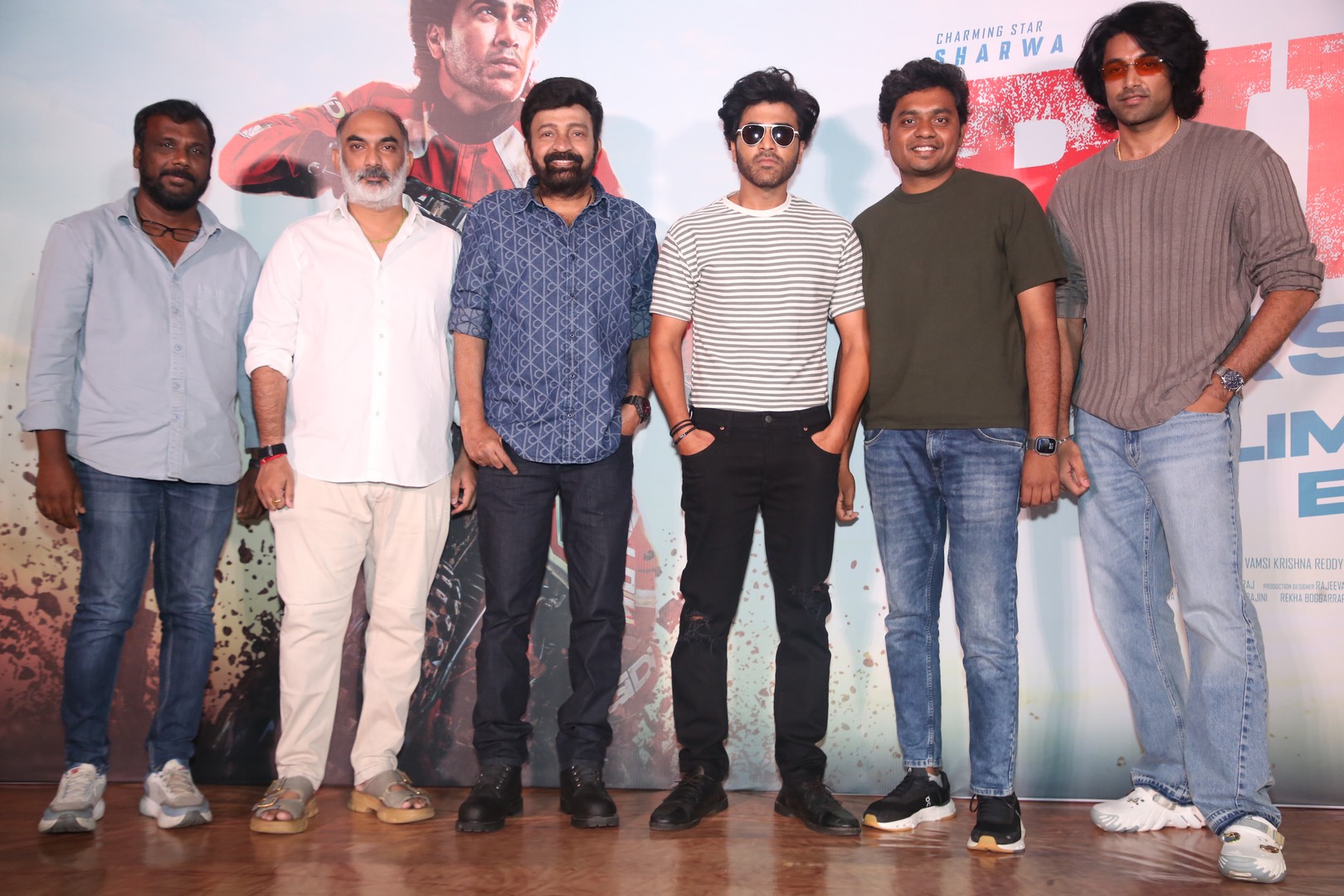 Biker movie cast and crew group photo at event