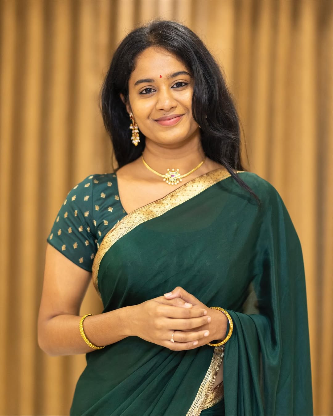 Brigida Saga regal in green saree with golden touch