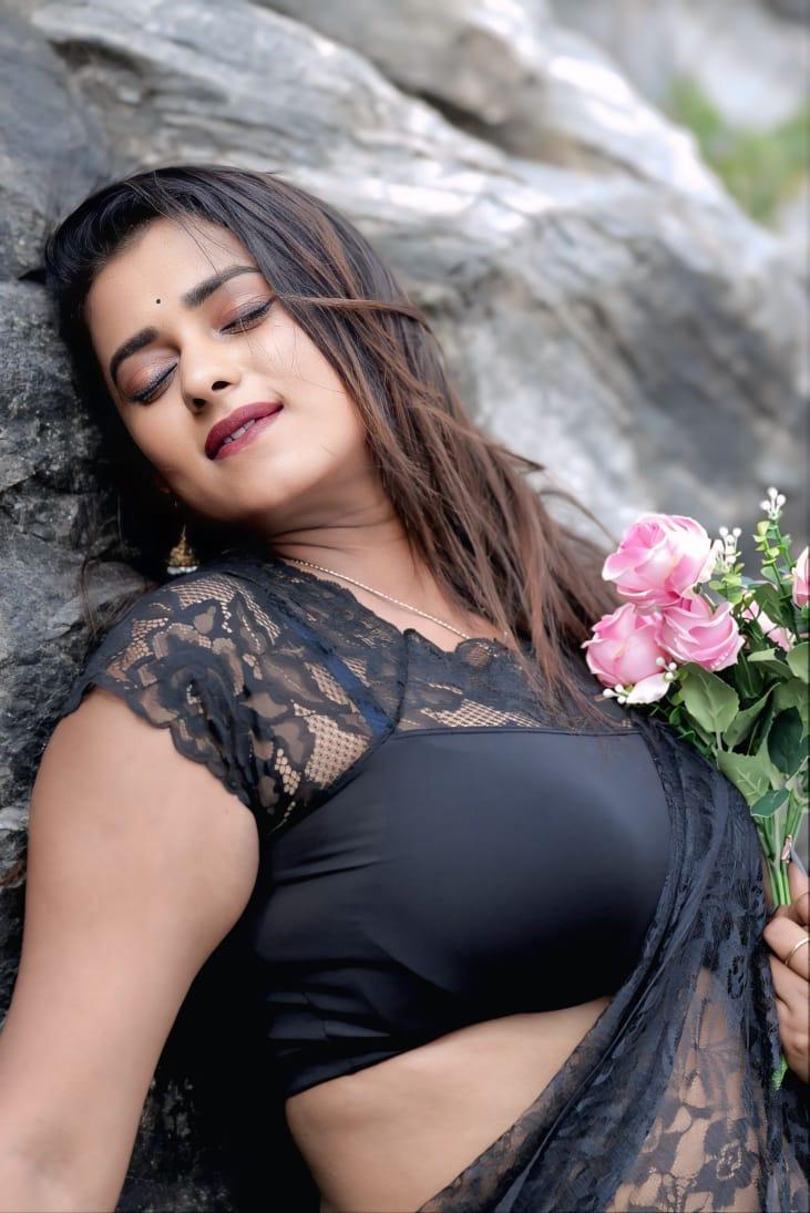 Chaitra Ram posing gracefully with lace and roses