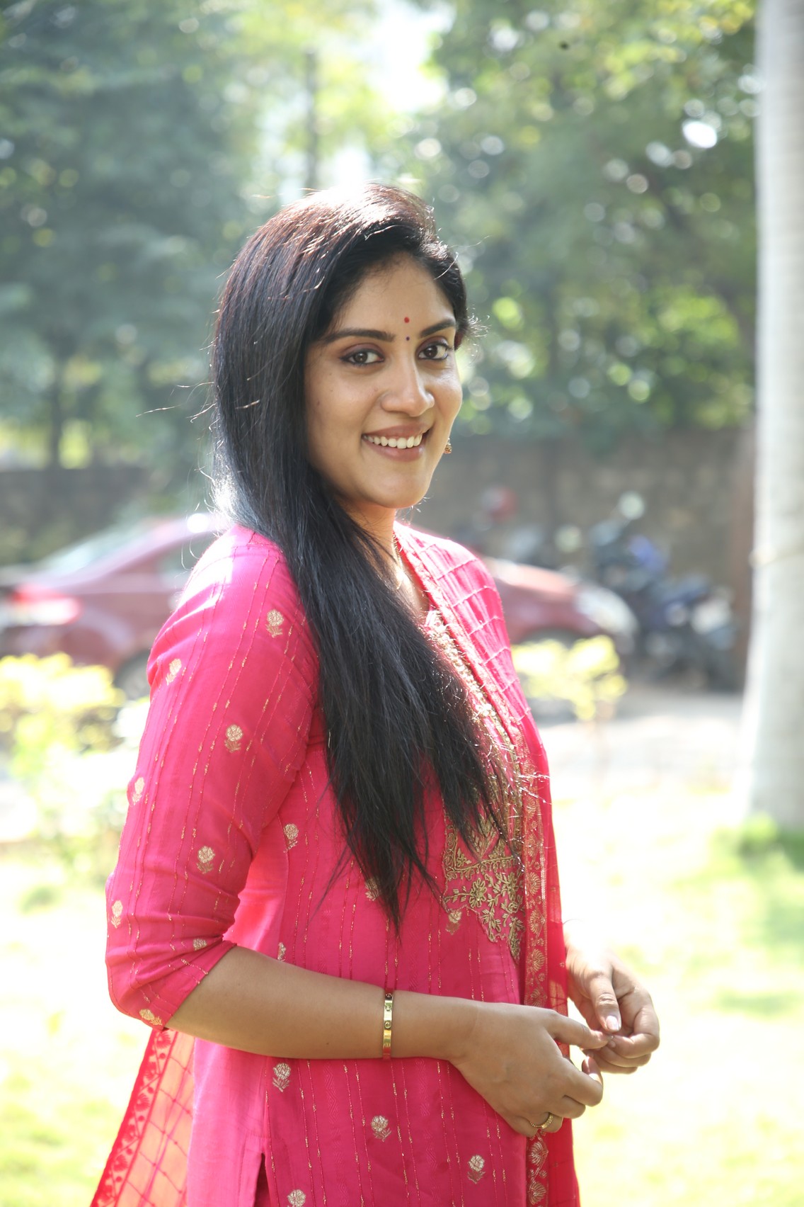 Dhanya Balakrishna glowing in pink with graceful charm