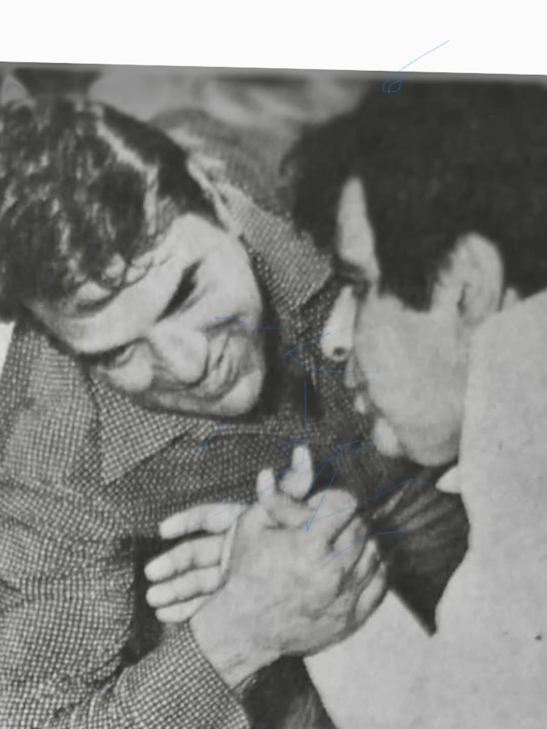 Dharmendra arm wrestling with Dilip Kumar