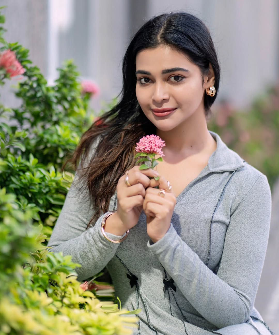 Dharsha Gupta stunning in chic dress and flower