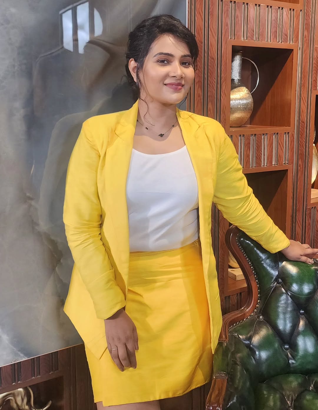 Dhivya Duraisamy dazzles in yellow power look with elegance