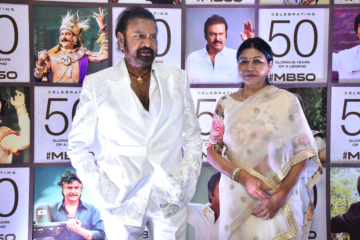 Dr. Mohan Babu and his wife posing gracefully for the media.