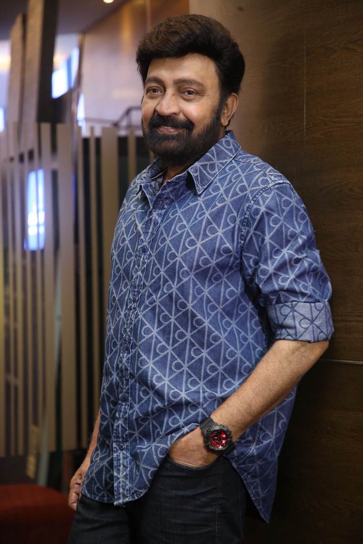 Dr. Rajasekhar Varadharajan relaxed elegance with confident friendly smile