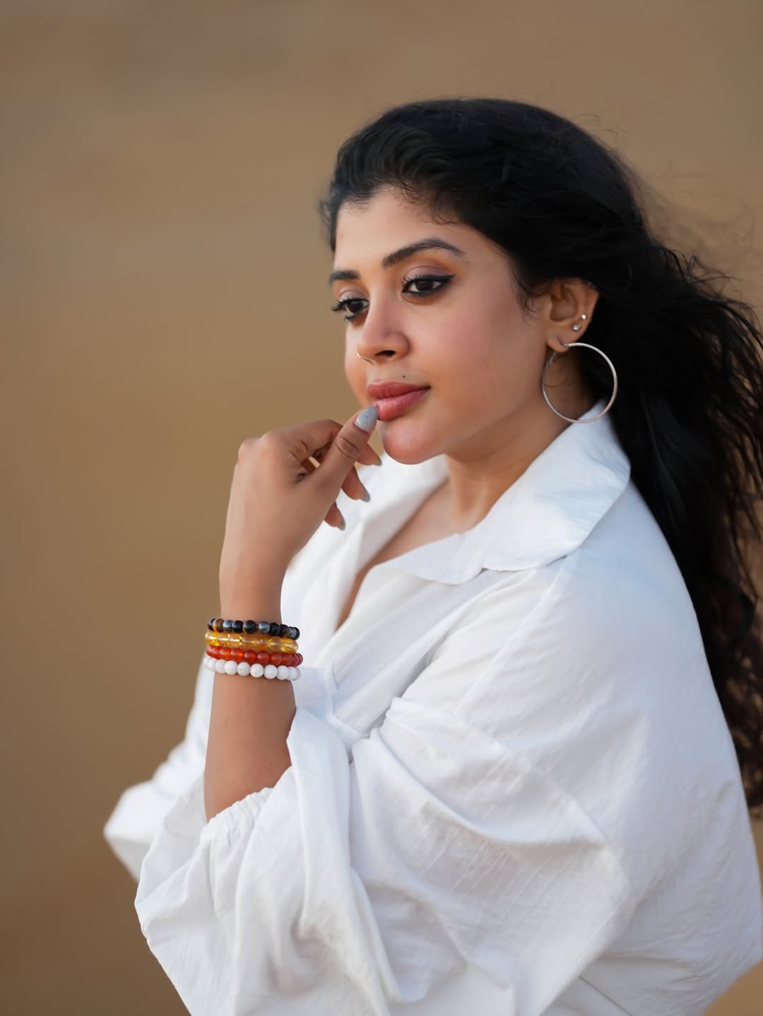 Gayathri Shan pairing white shirt with bold confidence