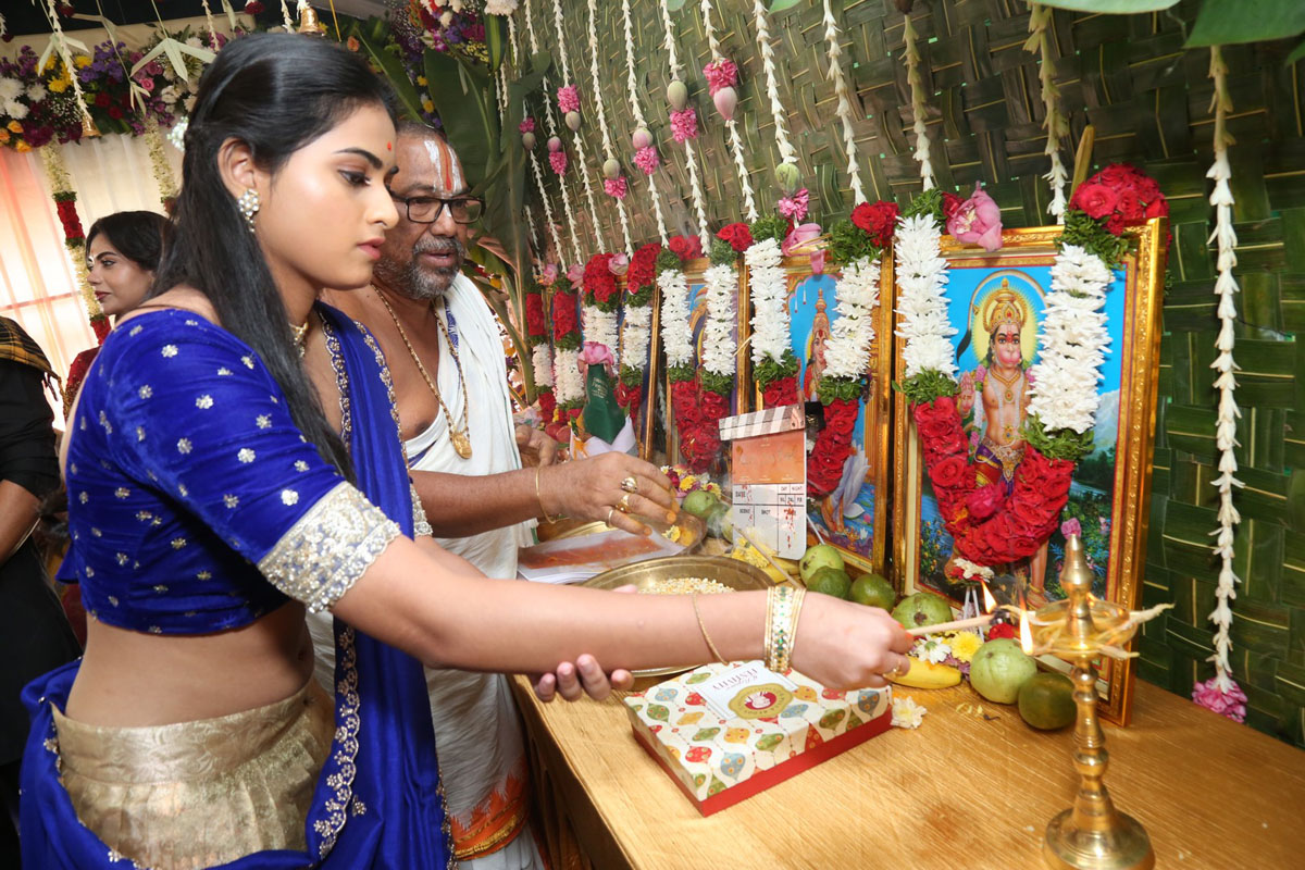 Vaishnavi Krishna lighting diya at launch event