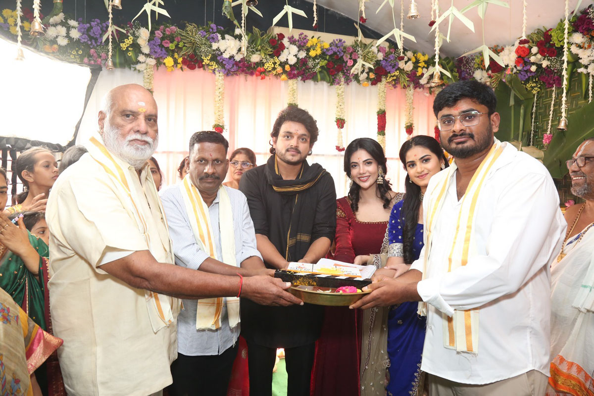 Movie team posing with Raghavendra Rao Kovelamudi for media