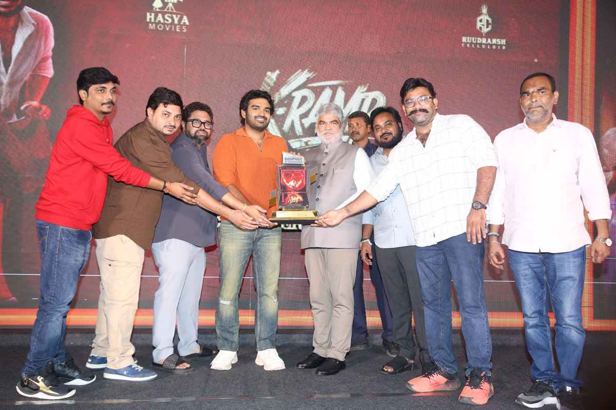 K-Ramp team celebrating with toast