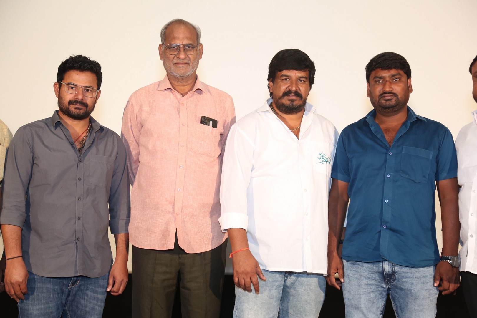 Film crew standing together at the launch function