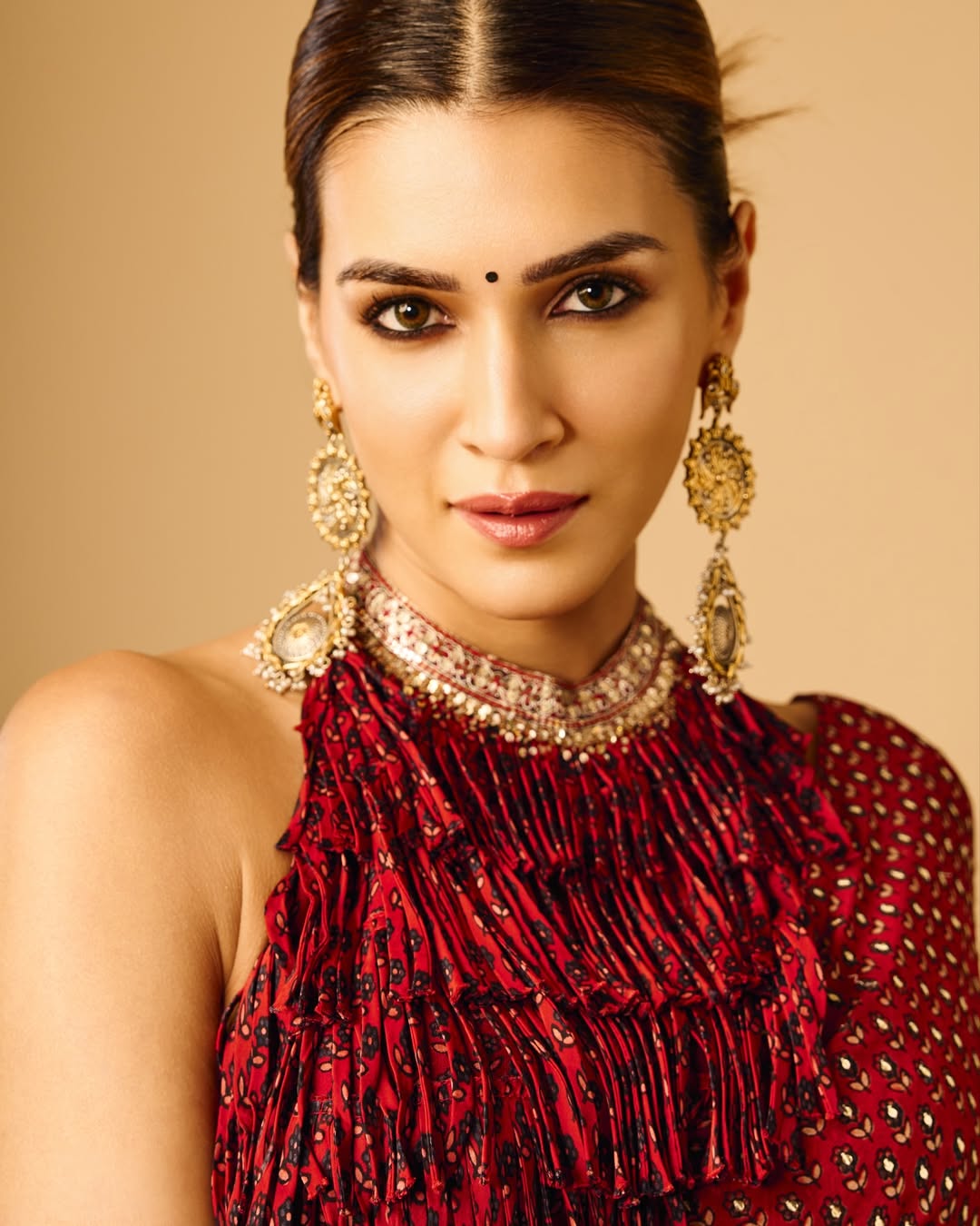Kriti Sanon glowing in regal red with elegance