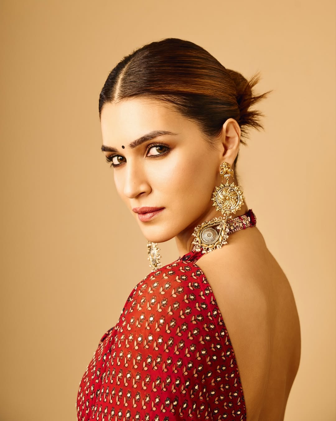 Kriti Sanon stunning in red with stylish attitude