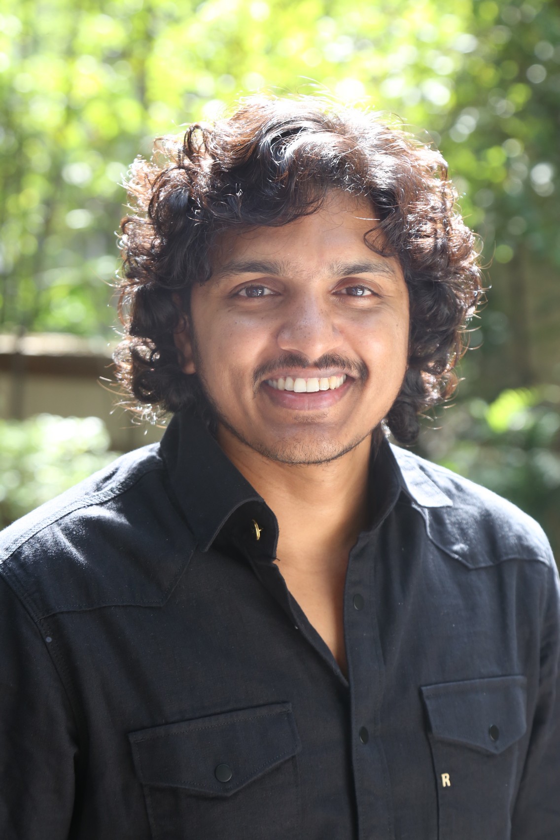 Mahesh Babu.P turning a black shirt into standout style