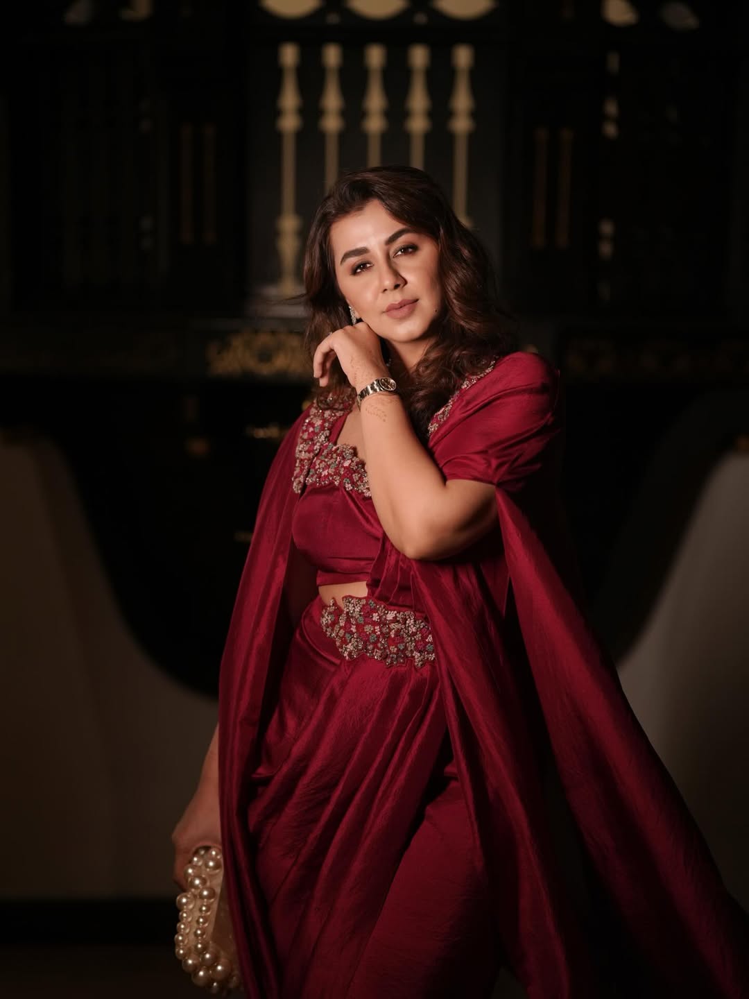 Nikki Galrani glowing in maroon saree with charm