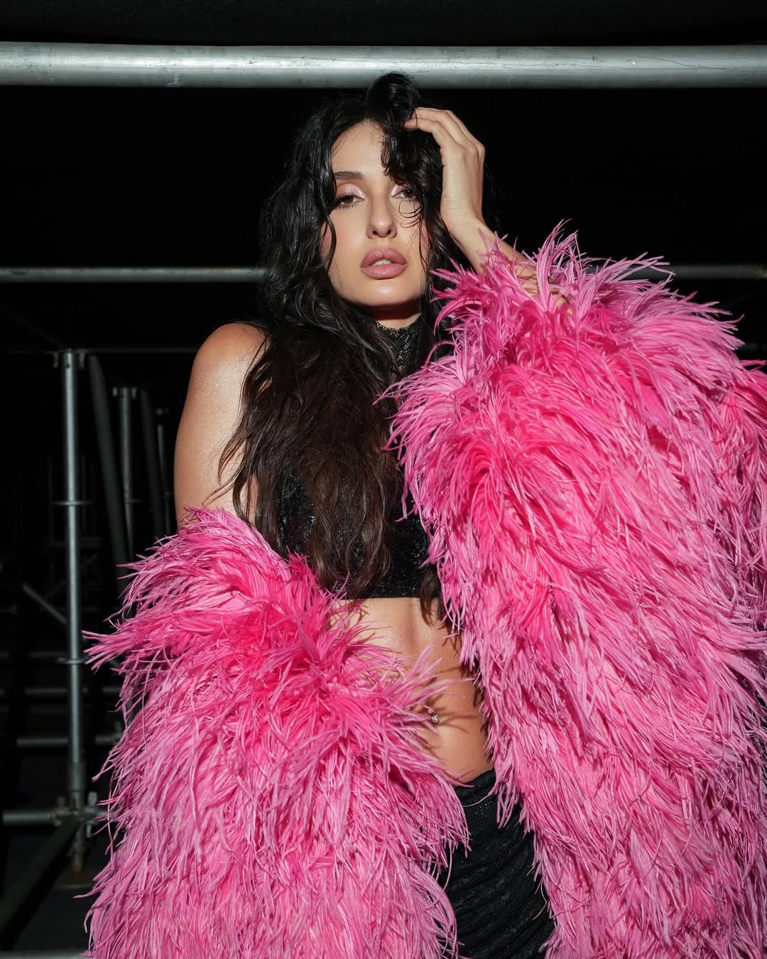 Nora Fatehi rocking feathers with fierce fashion flair