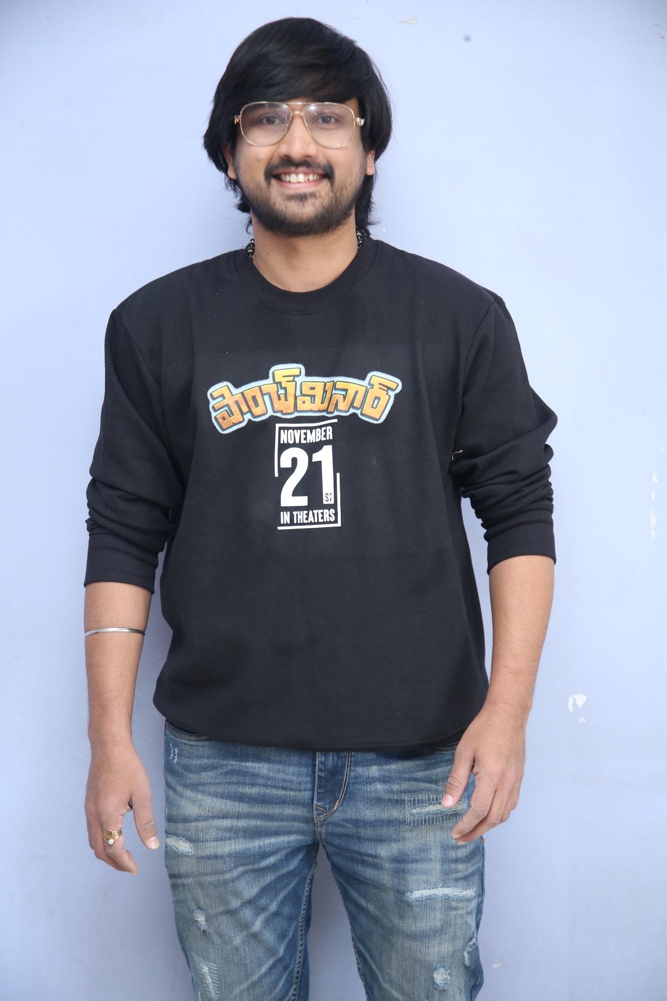 Raj Tarun posing confidently before media