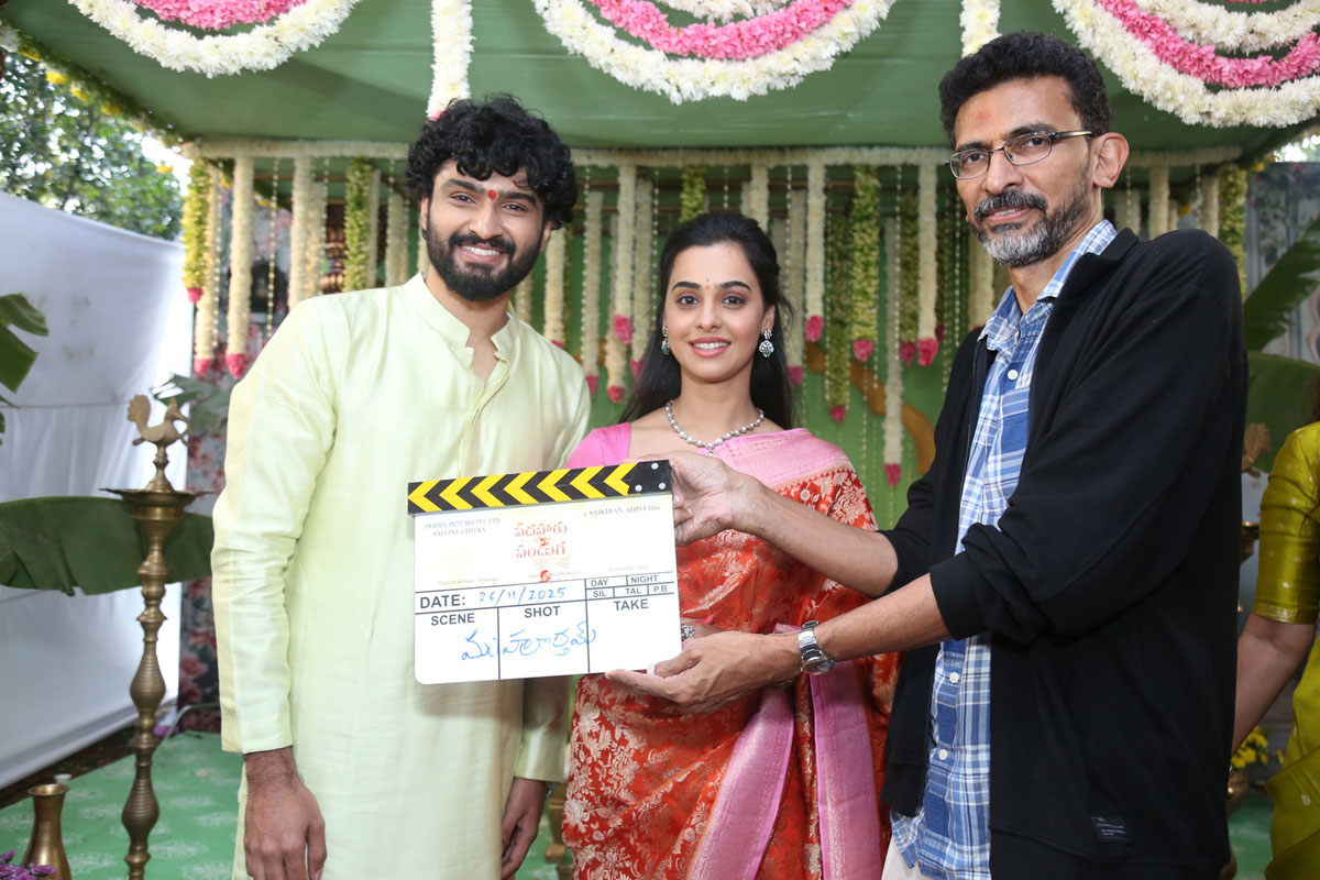 Crew holding clapboard during launch