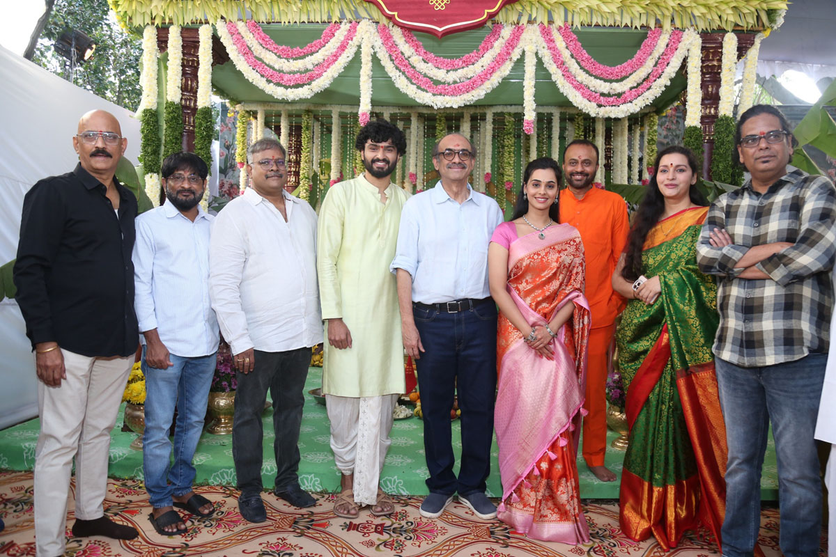 Movie team posing together during media interaction
