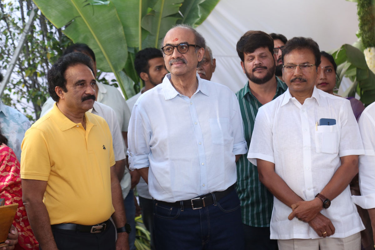 Entire team posing excitedly at launch event