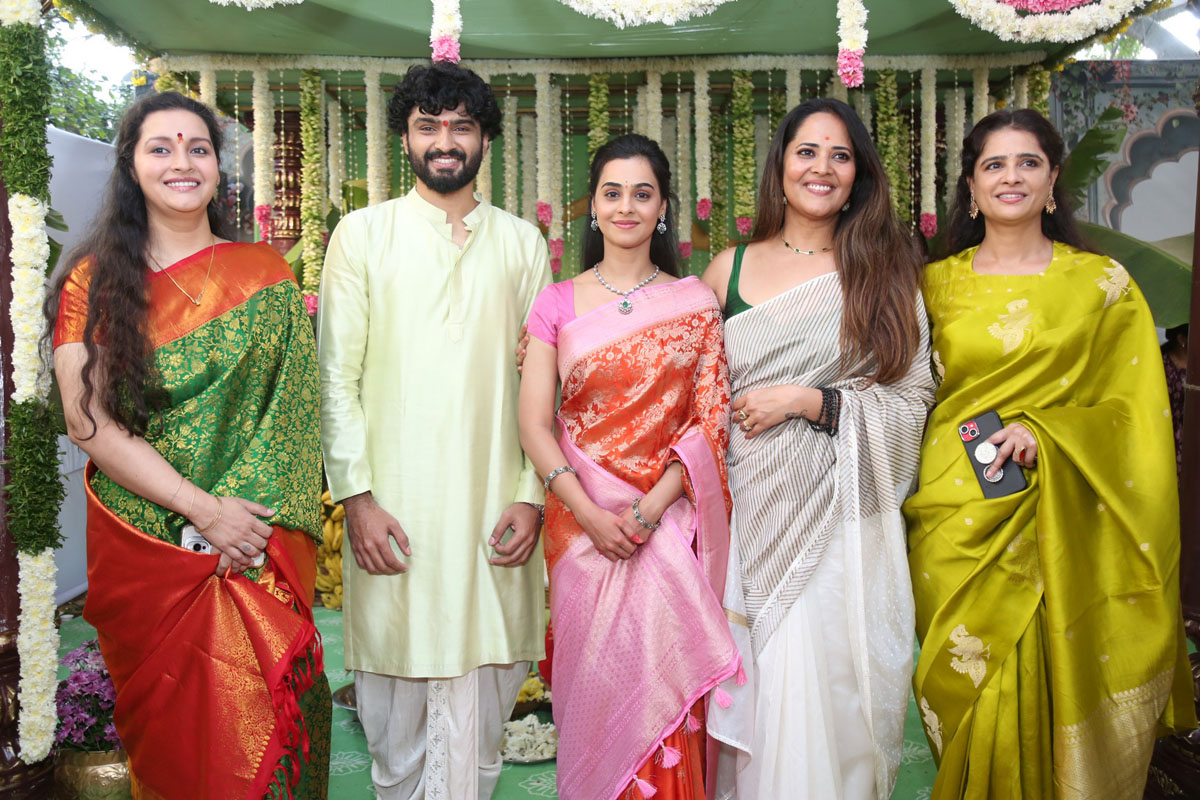 Lead actors posing with female team members