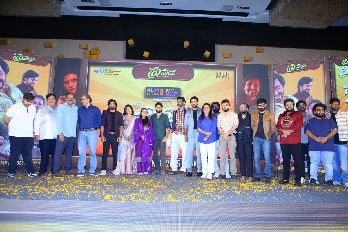 Full cast and crew posing together