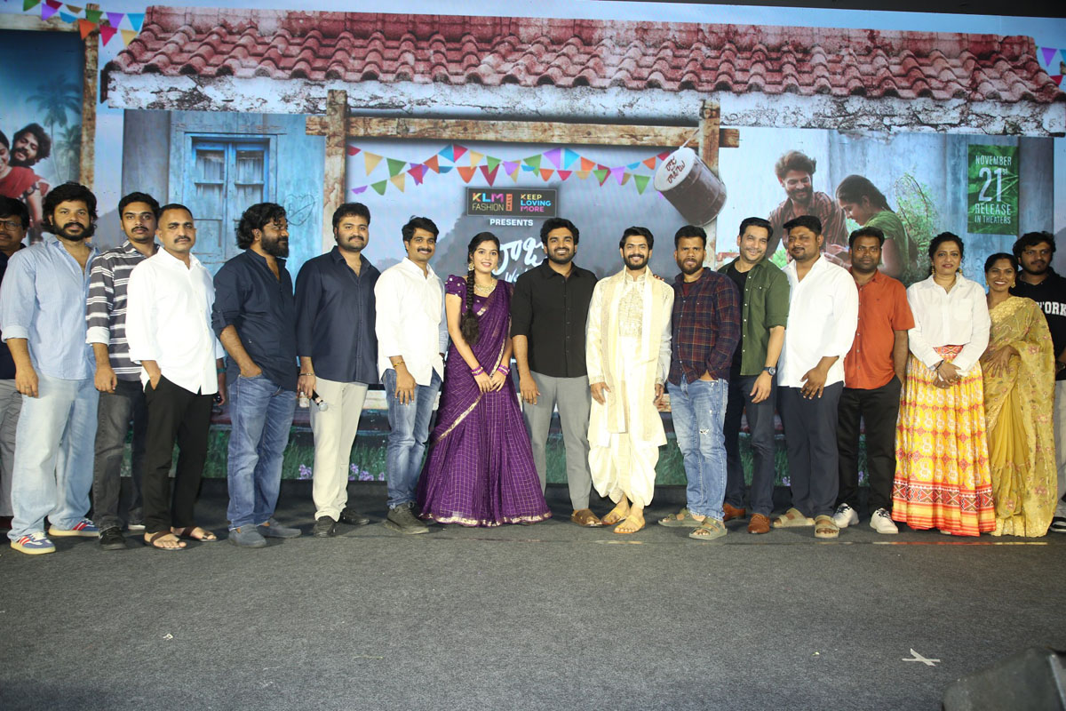 Cast and crew posing together