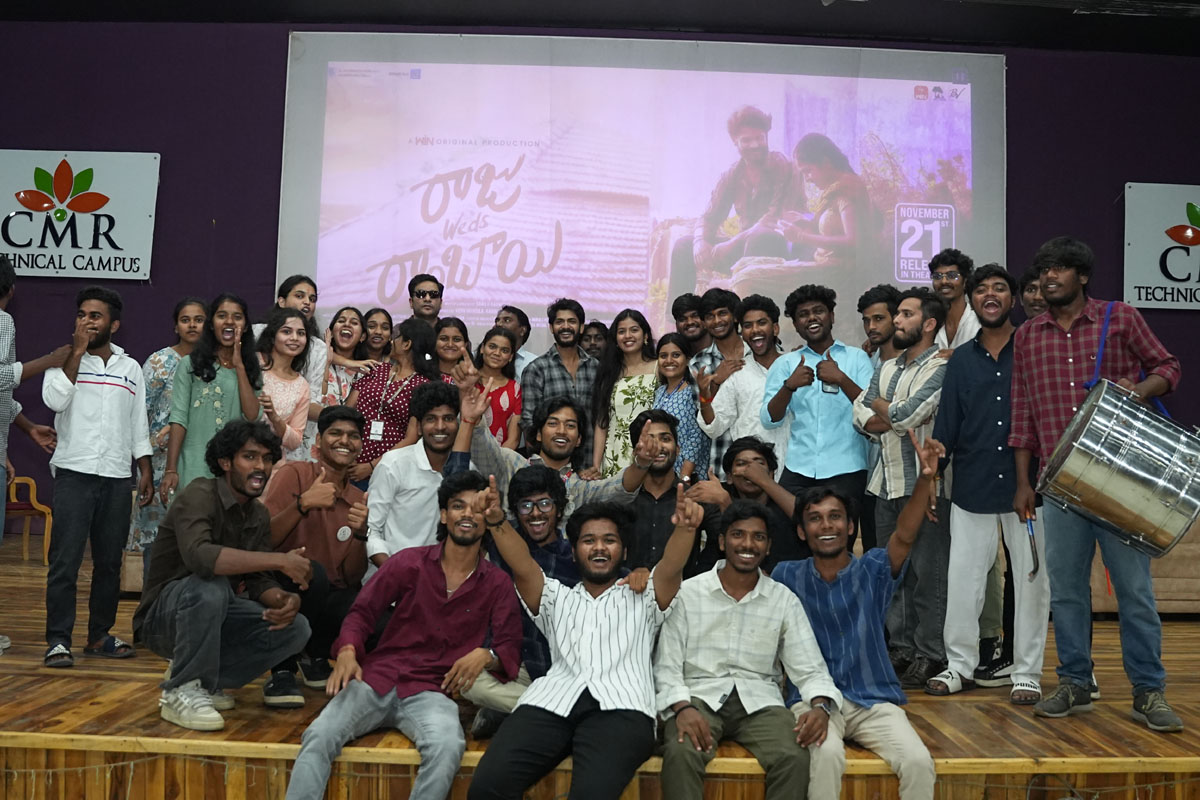 Students posing with Akhil Raj Uddemari and Tejaswi Rao at Raju Weds Rambhai event
