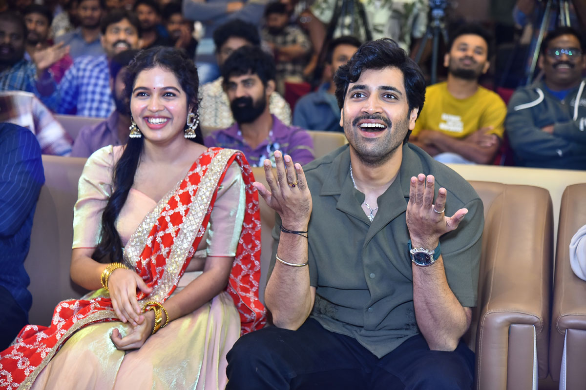 Tejaswi Rao Adivi Sesh seated laughing