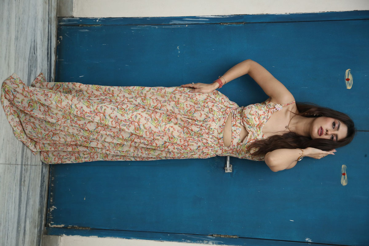 Rakhi Sharma shines in floral ensemble with confidence