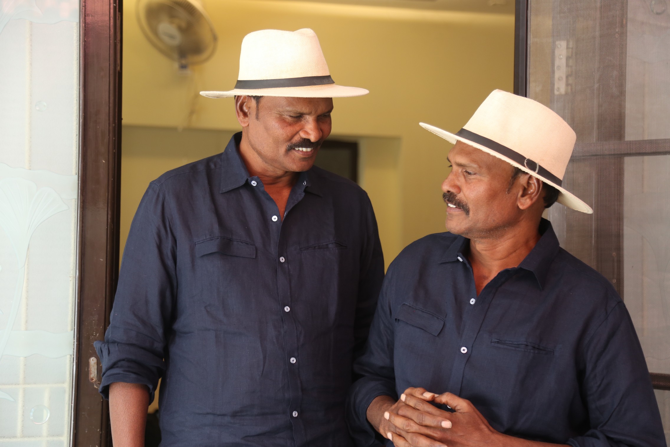 Ram Laxman in coordinated hats with composed expressions