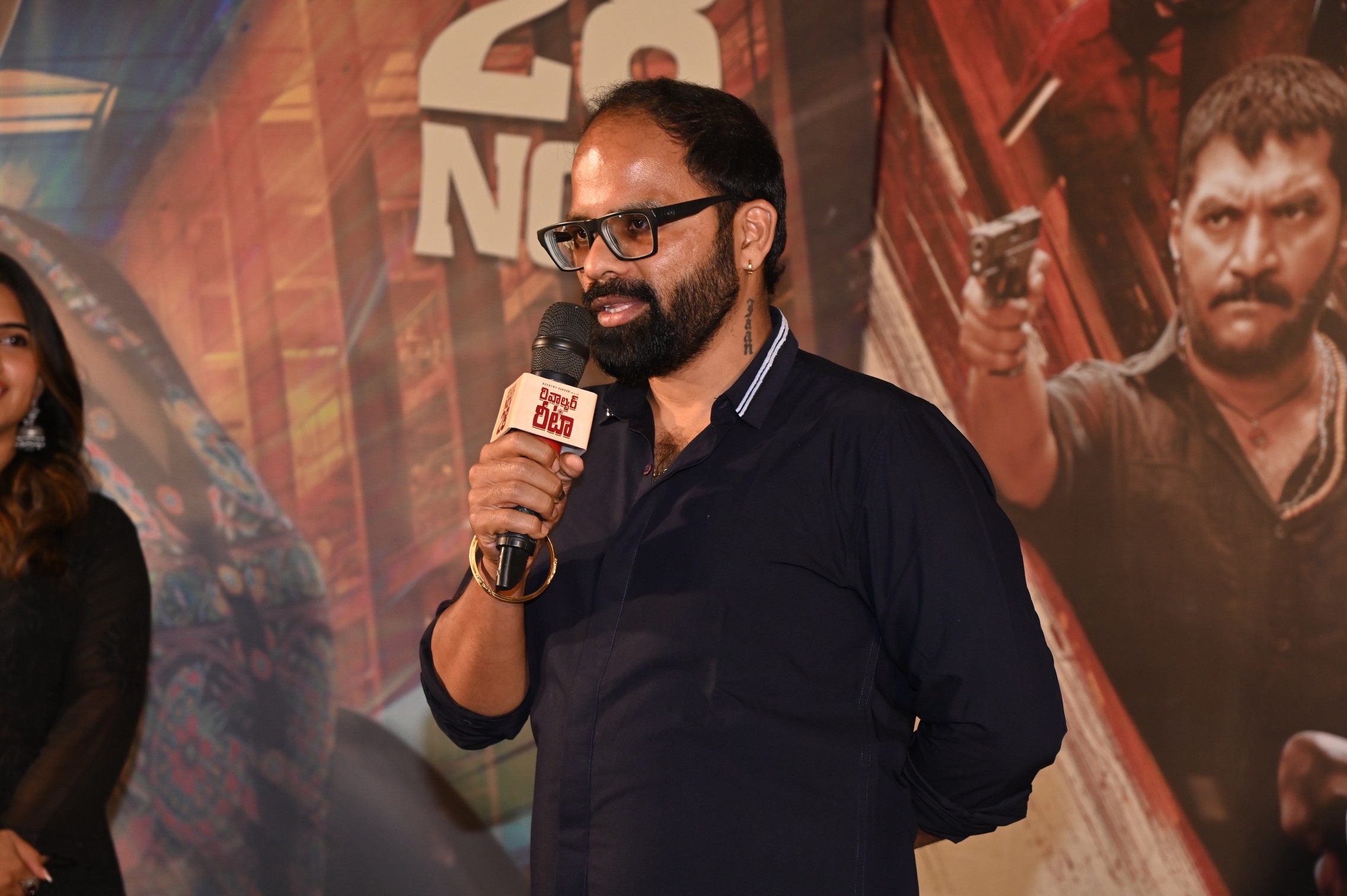 Distributor Kumar delivering speech at event