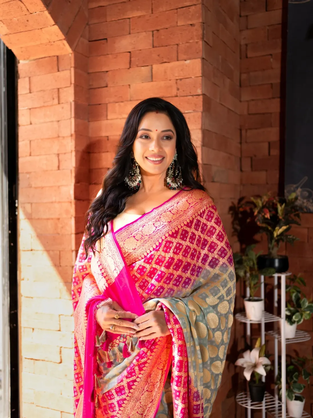 Rupali Ganguly glowing in pink and gold traditional look