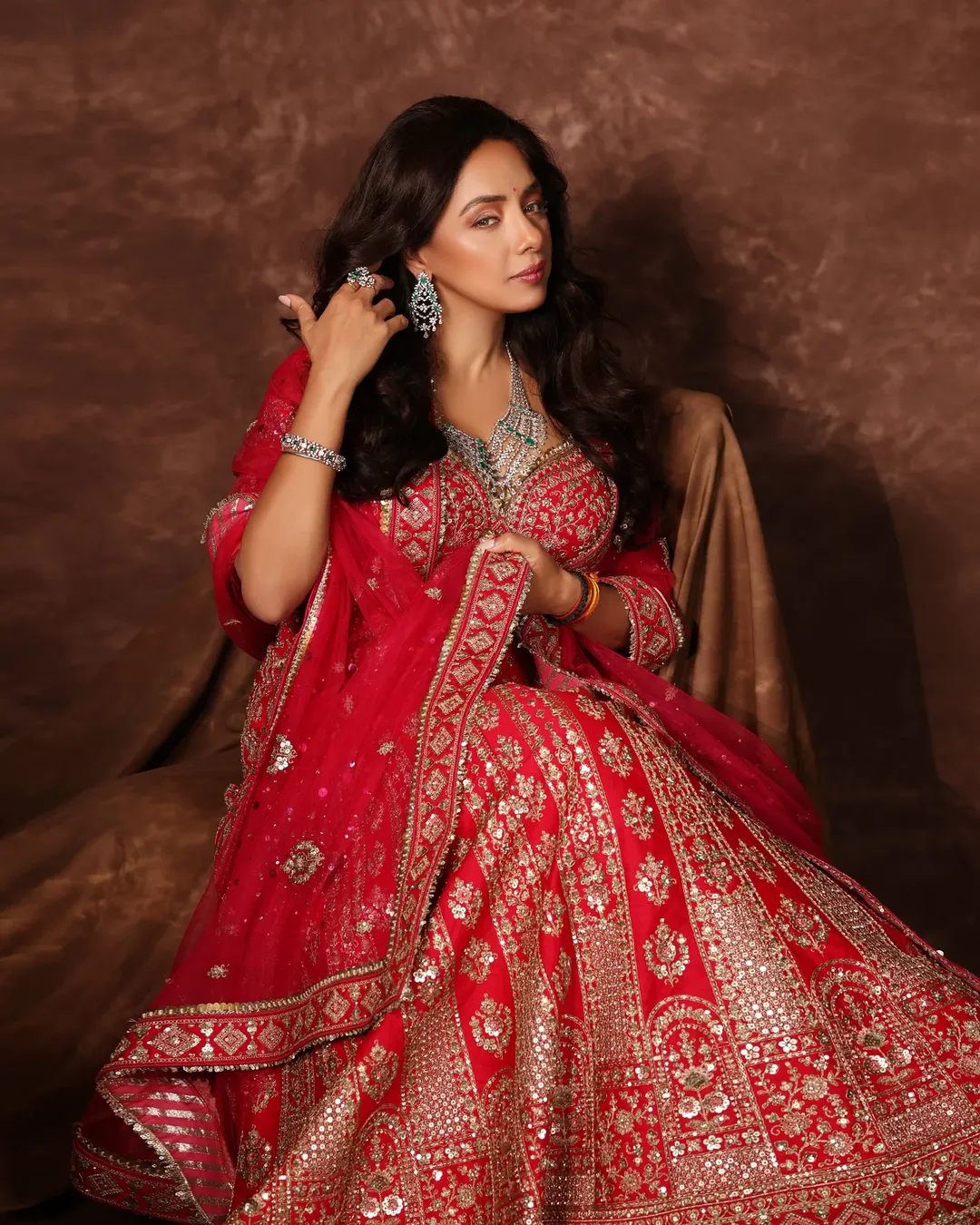 Rupali Ganguly sparkling brightly in elegant red attire