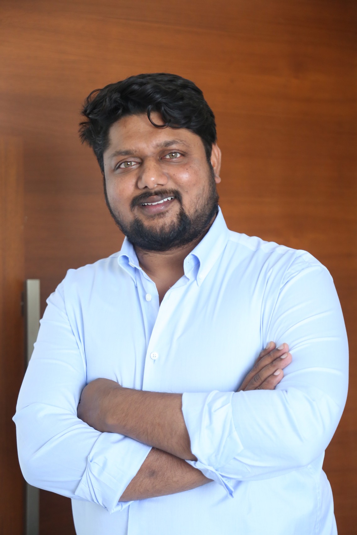 Sai Krishna smart style confident grin